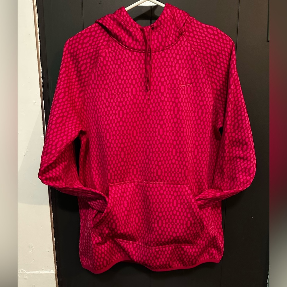 Woman’s pink Nike hoodie size: medium